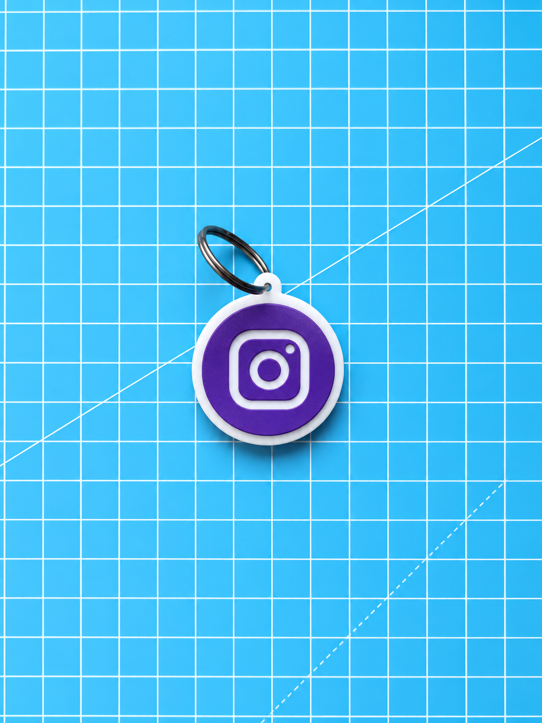3D Printed NFC Instagram Tag on blue grid background